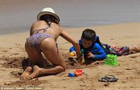 Sarah Shahi in a bikini - ass