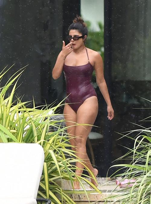 Priyanka Chopra Bikini Pictures Priyanka Chopra sexy tits in a wet swimsuit seen by paparazzi.