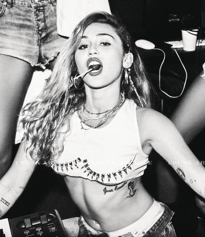 Miley Cyrus Pictures Miley Cyrus nude and sexy photo shoot for Von Magazine showing her topless boobs.