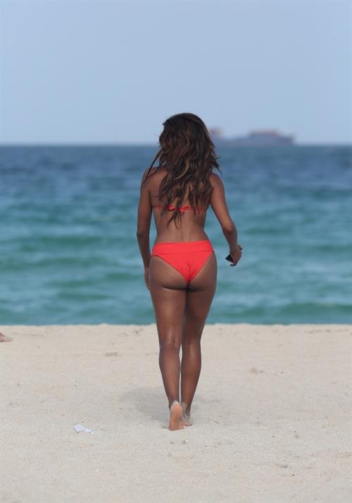 Claudia Jordan in a bikini - ass