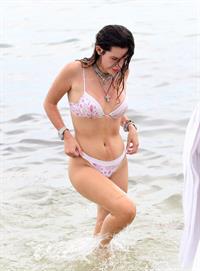 Bella Thorne areola peek in a sexy bikini at the beach seen by paparazzi.




