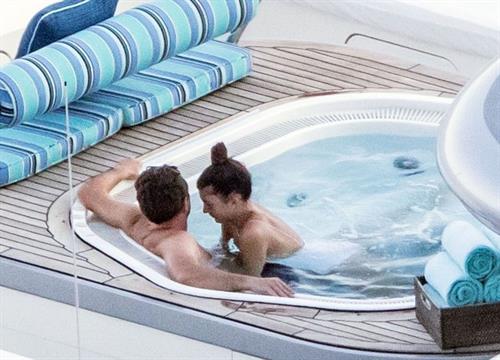 Camila Morrone Bikini Pictures Camila Morrone in a sexy swimsuit in a hot tub on a yacht with Leonardo DiCaprio seen by paparazzi.