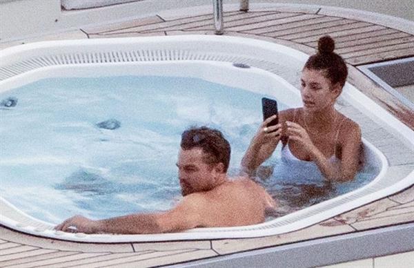 Camila Morrone in a sexy swimsuit in a hot tub on a yacht with Leonardo DiCaprio seen by paparazzi.










