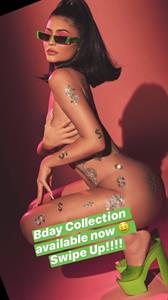 Kylie Jenner nude for her new birthday collection holding her naked boobs.



