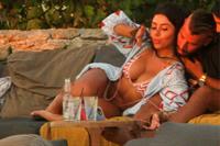 Martha Kalifatidis sexy in a bikini showing her ass and nice cleavage seen by paparazzi.





