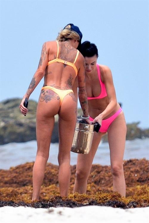 Jayde Nicole Bikini Pictures Jayde Nicole Sexy and Tina Louise caught nude by paparazzi showing their topless boobs at the beach.