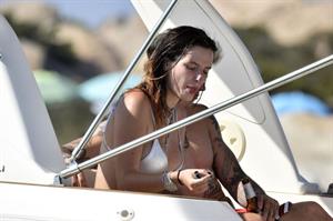 Bella Thorne sexy in a thong bikini drinking and smoking weed out on the water showing off her ass seen by paparazzi.



