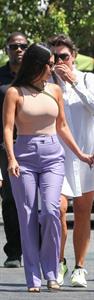 Kourtney Kardashian braless boobs in a nude tank top showing off her tits pokies with Kris Jenner seen by paparazzi.














