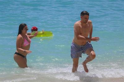 Stassi Schroeder and Katie Maloney-Schwartz sexy at the beach seen by paparazzi in a bikini and a swimsuit showing nice cleavage.