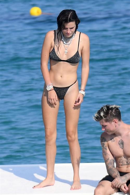 Bella Thorne Bikini Pictures Bella Thorne making out and having fun with her boyfriend in a sexy little bikini seen by paparazzi.