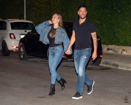 Laura Müller braless boobs in a see through top showing nice cleavage seen by paparazzi.









