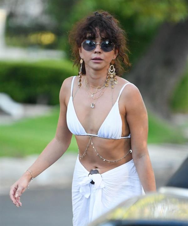Sarah Hyland sexy in a bikini top leaving a pool party seen by paparazzi.



























