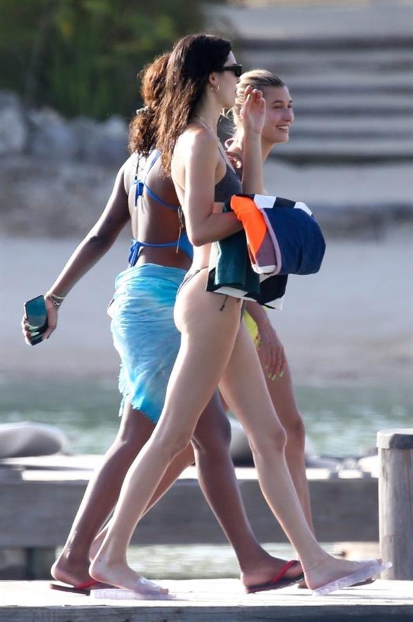 Hailey Bieber, Kendall Jenner and Justine Skye sexy bikini and swimsuit photos seen on a boat drinking for Hailey Bieber's bachelorette party.
