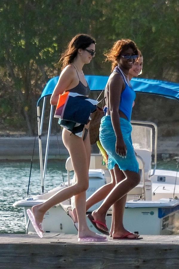 Hailey Bieber, Kendall Jenner and Justine Skye sexy bikini and swimsuit photos seen on a boat drinking for Hailey Bieber's bachelorette party.
