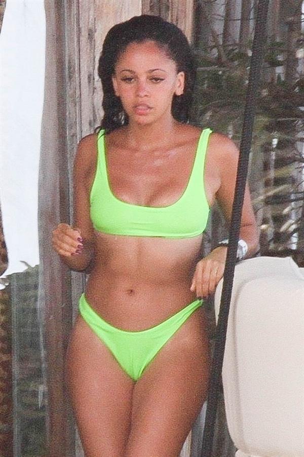 Vanessa Morgan in a tight green bikini showing nice cleavage and her sexy ass seen by paparazzi.




















