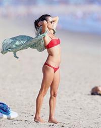 Alessandra Ambrosio sexy ass and cleavage in a thong bikini seen at the beach by paparazzi.





