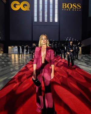 Charlotte de Carle braless boobs in an open jacket seen by paparazzi.
