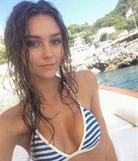 Rachel Cook in a bikini taking a selfie