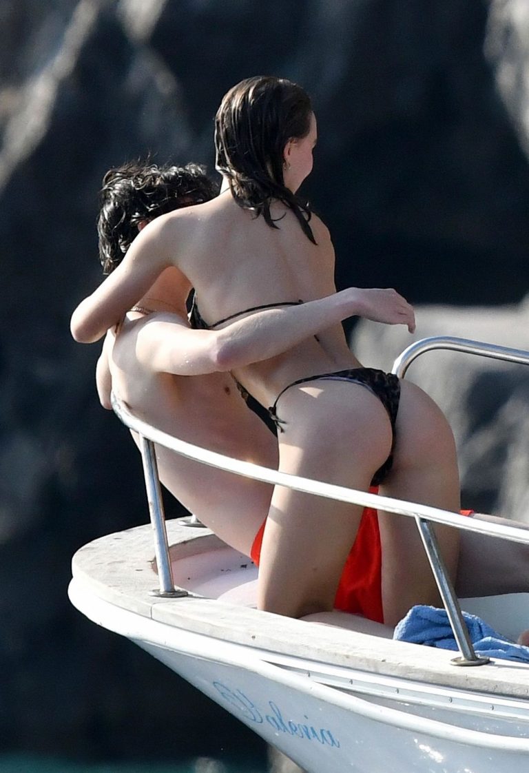 Lily-Rose Depp Bikini Pictures Lily-Rose Depp sexy ass in a little thong bikini making out with Timothee Chalamet on a boat seen by paparazzi.