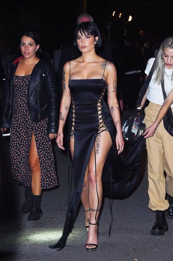 Halsey sexy in a very revealing laced dress seen by paparazzi arriving to DKNY fashion show in New York.






















