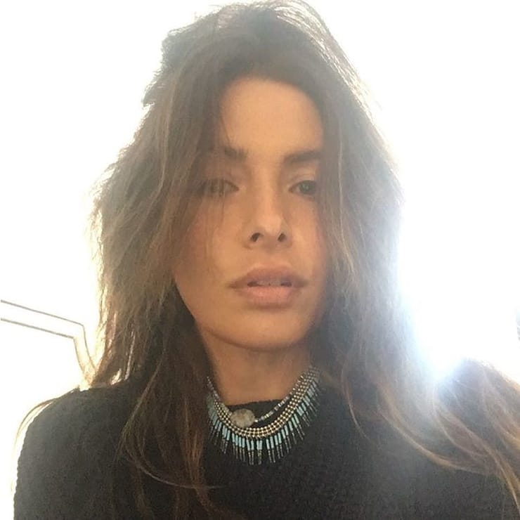 Sarah Shahi taking a selfie
