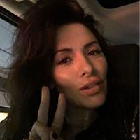 Sarah Shahi taking a selfie