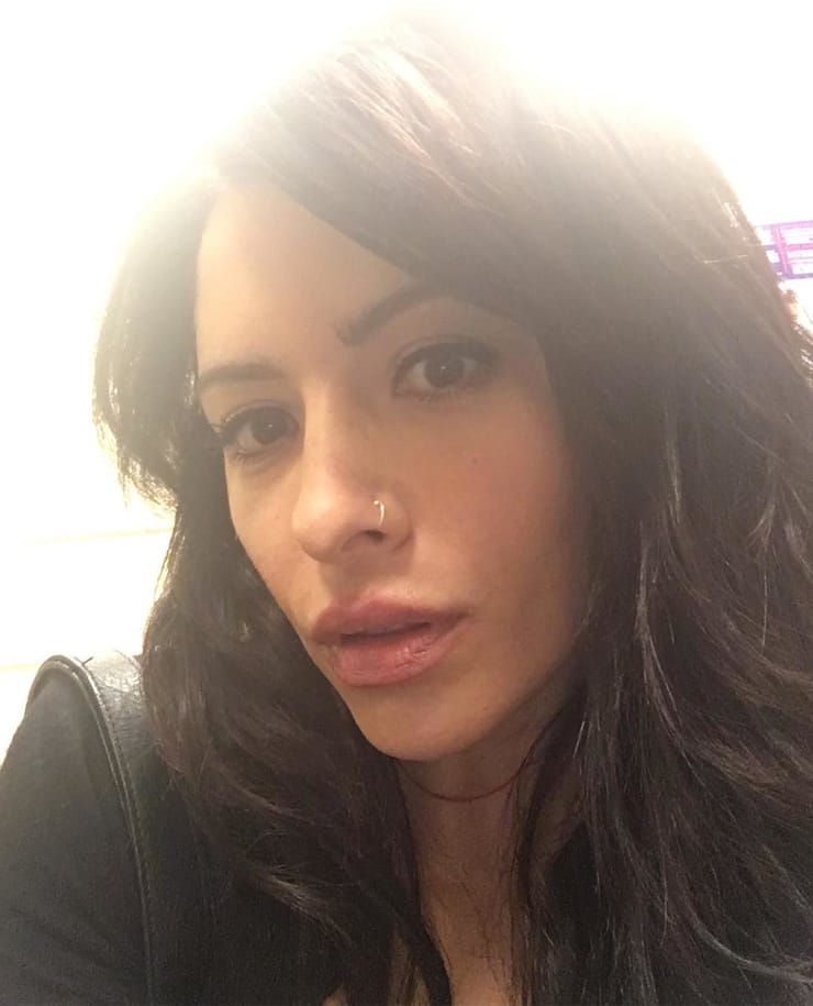 Sarah Shahi taking a selfie