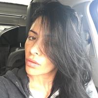 Sarah Shahi taking a selfie