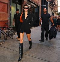 Kendall Jenner braless boobs in a see through top showing off her tits seen by paparazzi.






























