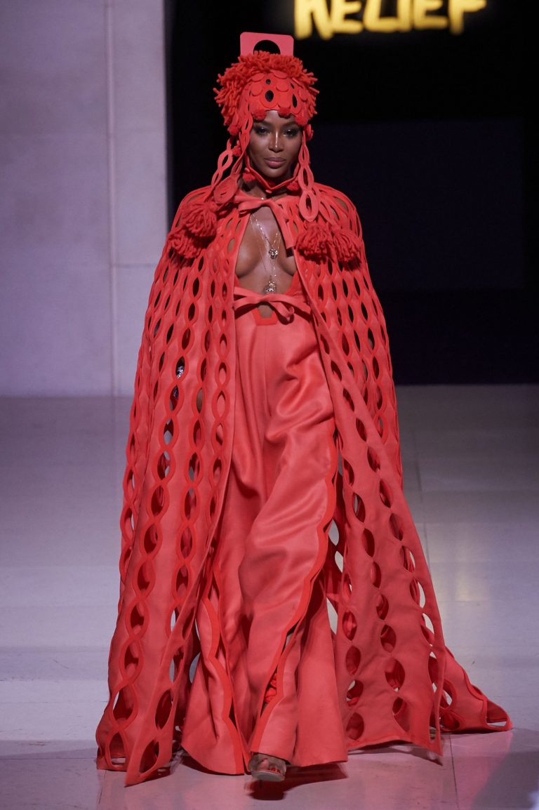 Naomi Campbell braless boobs in a see through dress modelling on the runway showing her tits.


























