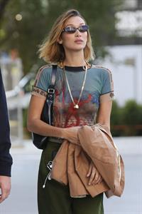 Bella Hadid braless tits leaving Versace seen by paparazzi showing off her boobs.


































































