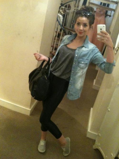 Zoe Sugg taking a selfie