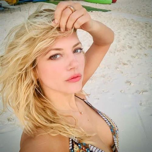 Katheryn Winnick in a bikini taking a selfie
