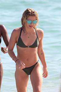 Emily Bett Rickards in a bikini