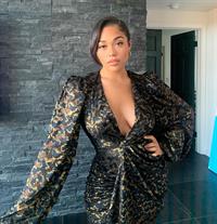 Jordyn Woods braless boobs showing nice cleavage in a low cut revealing outfit.


























