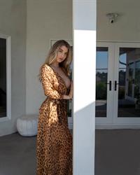 Emily Sears Pictures Emily Sears big boobs showing nice cleavage in a silk robe.