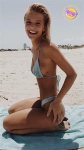 Marie Tomas in a bikini