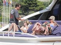 Uma Thurman wearing a bikini top on a yacht in St Tropez July 7, 2013 