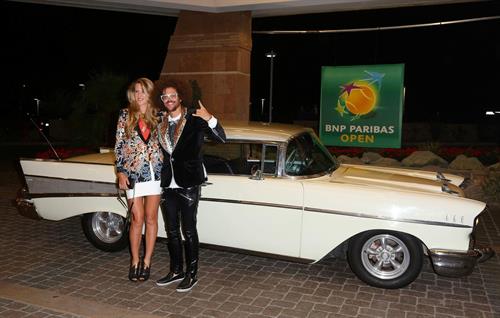 Victoria Azarenka and LMFAO Singer Redfoo arrive for a Player's Party at the IW Club March 7, 2013 