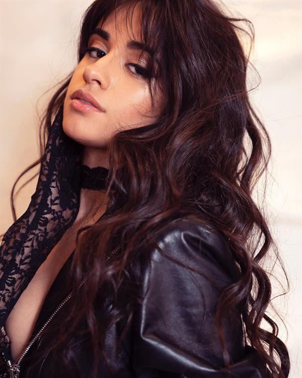 Camila Cabello sexy little outfit showing off her ass and nice cleavage.