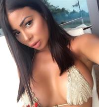 Maeva Ghennam in a bikini