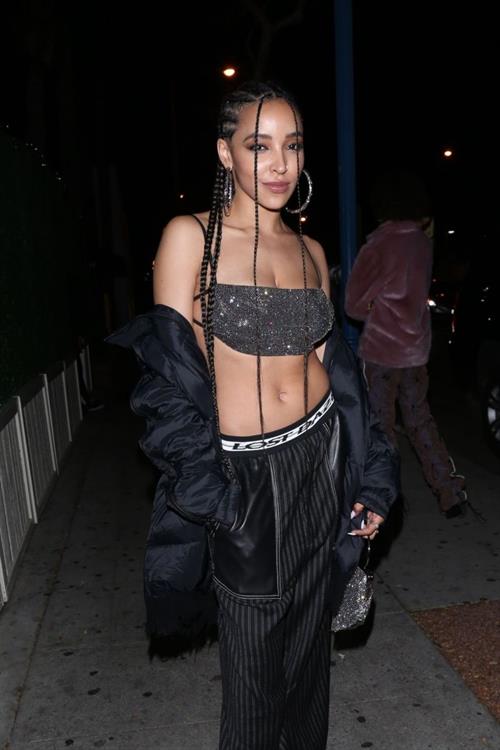 Tinashe braless boobs in a revealing little top showing nice cleavage and sideboob seen by paparazzi leaving the club.