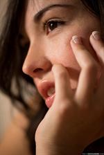 Emily Grey lifts up her dress