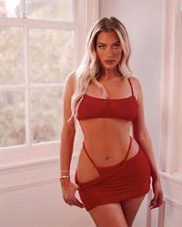 Anastasia Karanikolaou in sexy red see through lingerie for Valentine's Day showing off her big tits and ass in a thong.