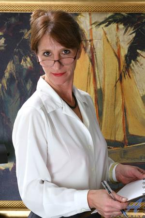 Professional business woman Kimberly lifts up her skirt