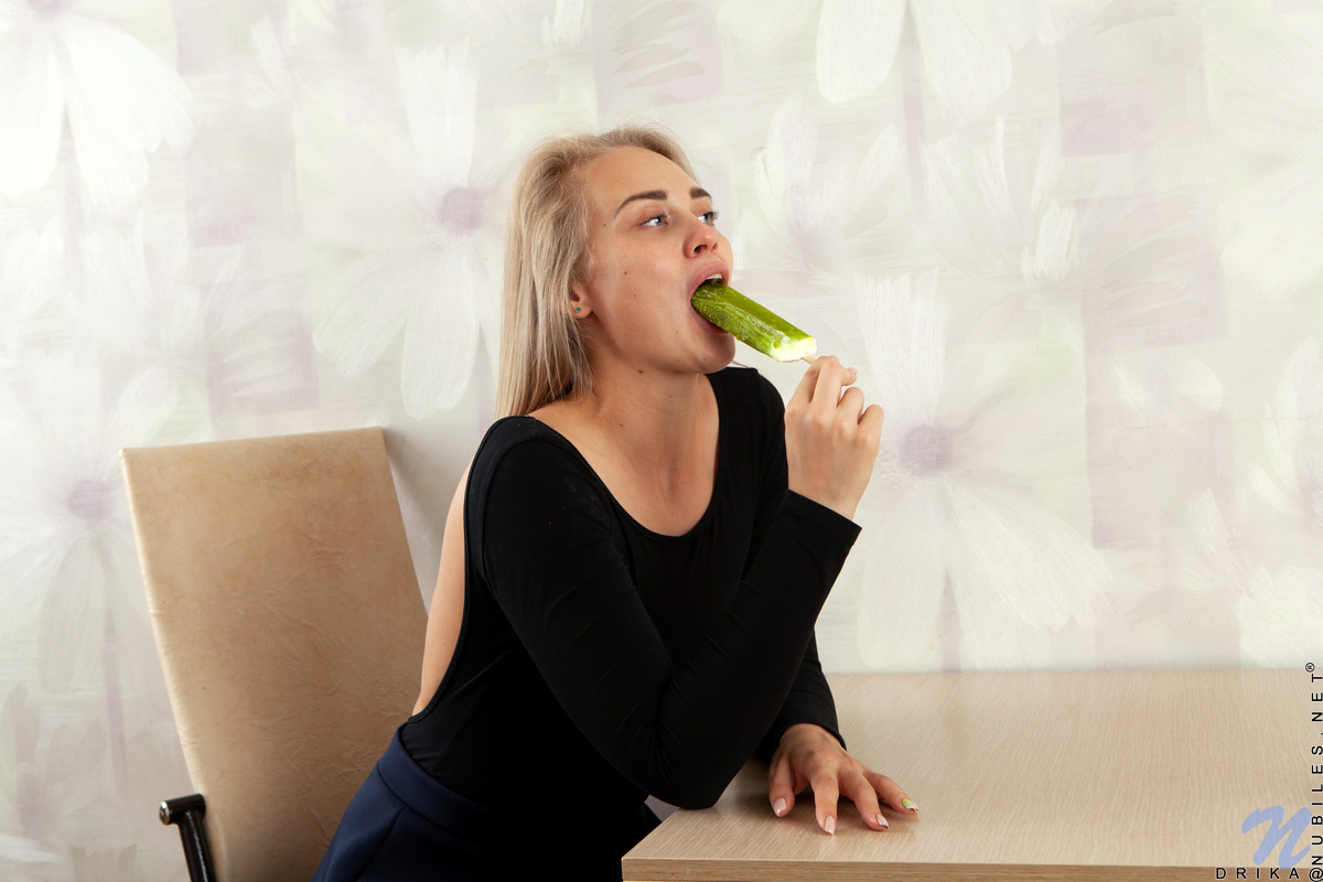 When Drika is done daydreaming about shoving her popsicle deep into her cock hungry twat, she decides it's time to experiment. She peels off her clothes and rubs the cold treat against her pierced nipple, then kicks off her high heels and climbs up on the table so she can play with her bare twat.