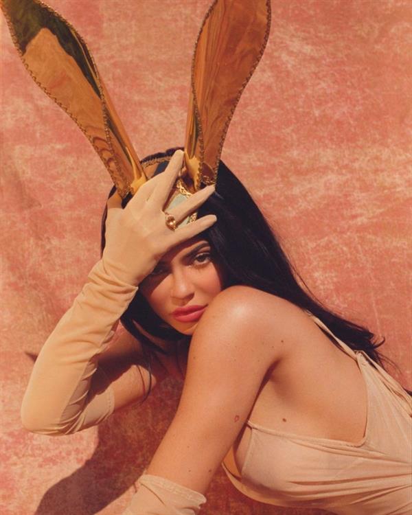 Kylie Jenner braless boobs in a see through dress showing off her big tits in a sexy little Easter photoshoot.