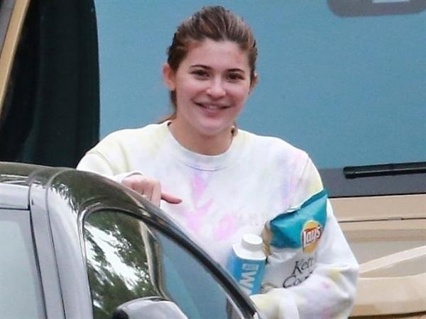 Kylie Jenner with no makeup out getting snacks including water and chips during quarantine visiting her friend Stassie Baby seen by paparazzi.