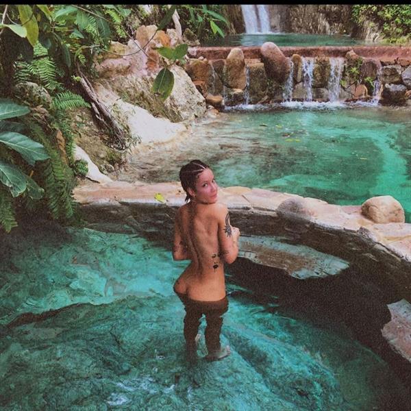 Halsey nude new photo she shared from on vacation fully naked in a natural pool showing off her ass.