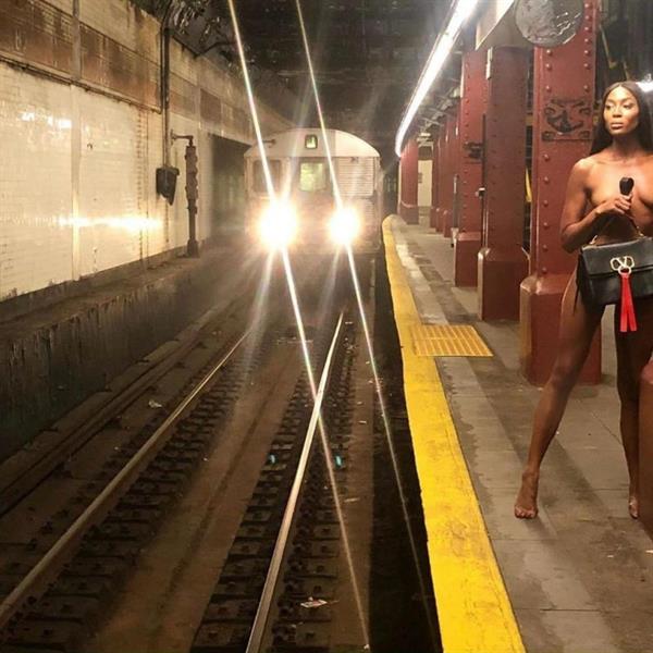 Naomi Campbell nude new unpublished photoshoot posing naked in a New York City subway showing off her tits.